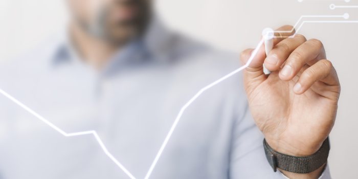 Man giving a business presentation using a futuristic digital pen