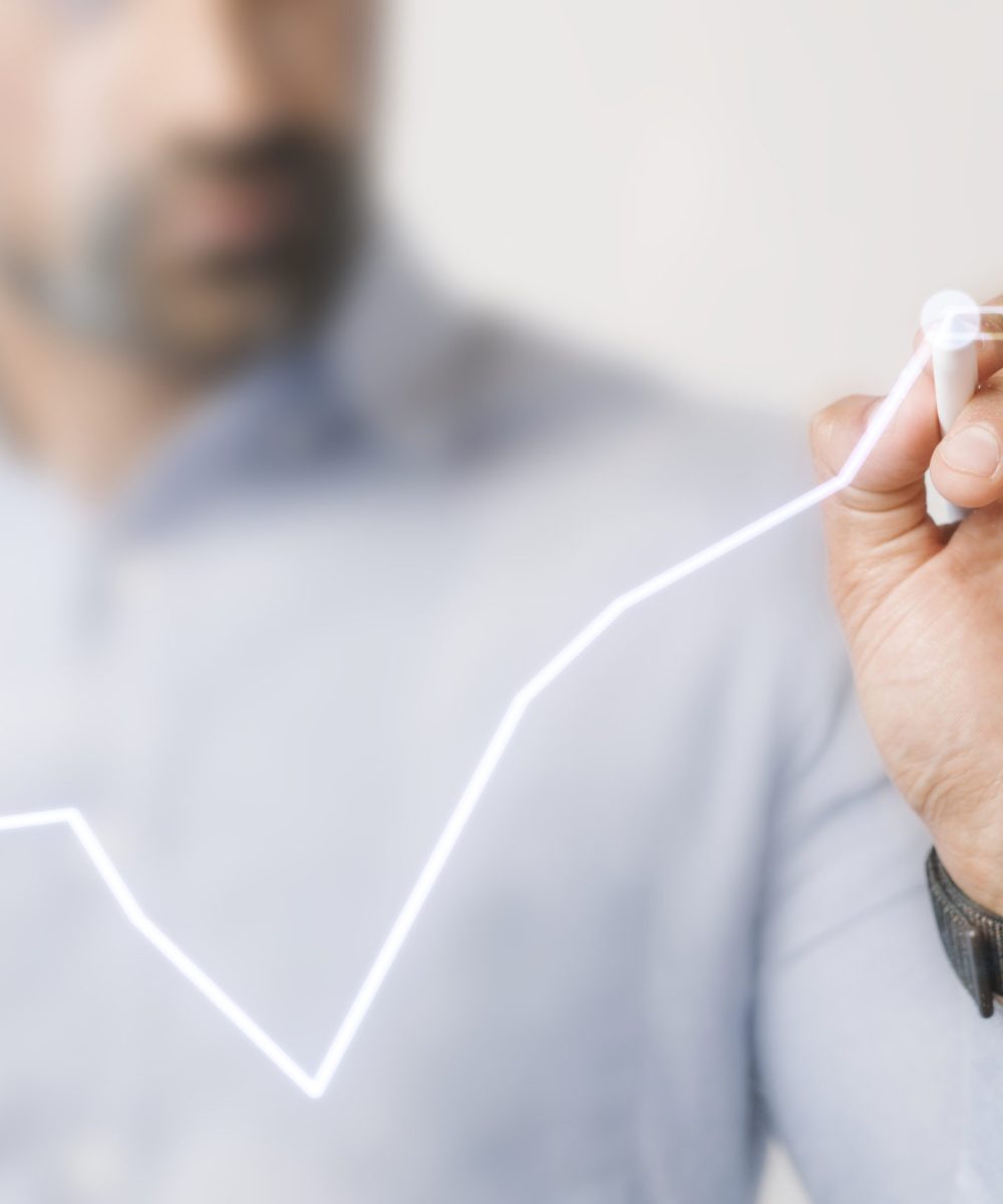 Man giving a business presentation using a futuristic digital pen